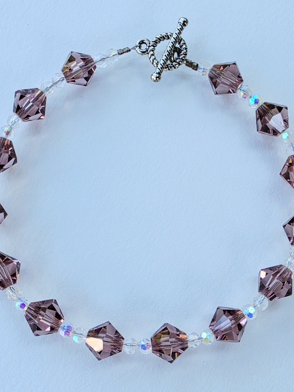Handmade purple crystal bicone and clear faceted glass beaded bracelet